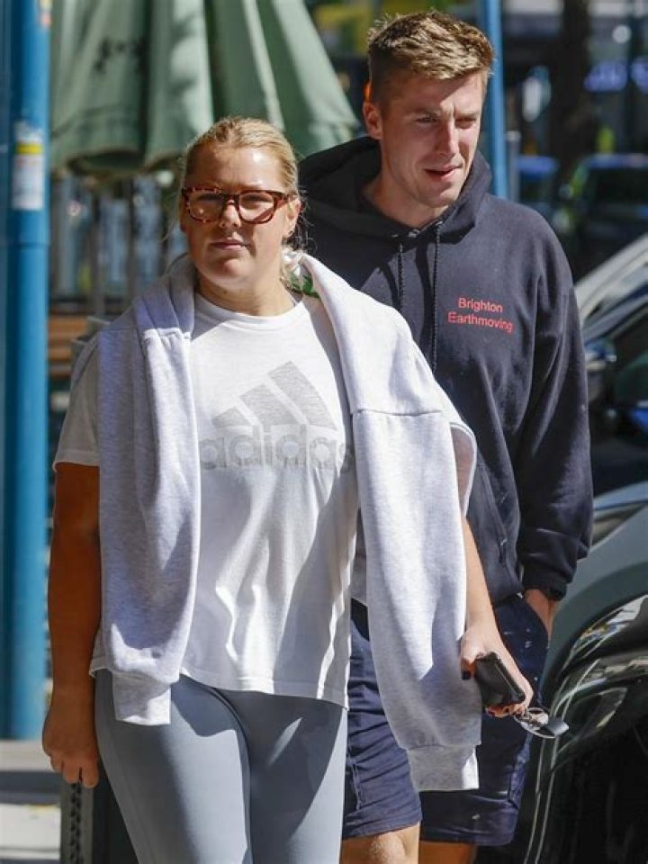 Brooke Warne looking relatable with boyfriend Alex Heath in Melbourne