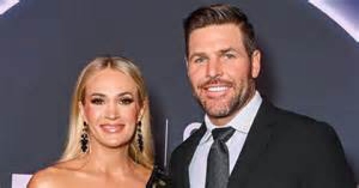 Carrie Underwood's husband Mike Fisher has fans divided with rare photo of son Isaiah
