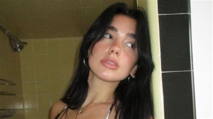 Dua Lipa sets pulses racing in skimpy black bikini