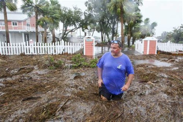 Hurricane Idalia hits Florida with 125 mph winds, flooding streets, snapping trees and cutting power