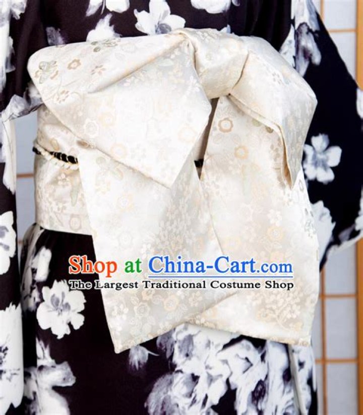 Kimono Sash Crossword Clue - News