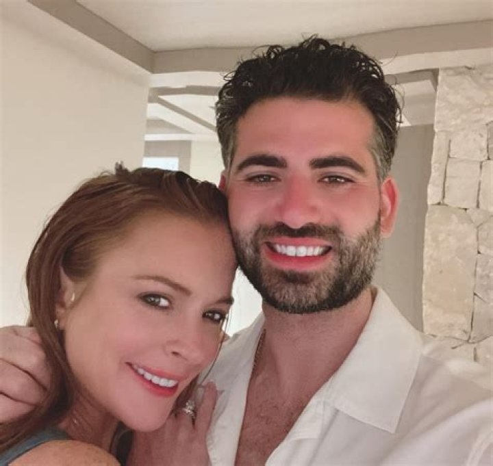 Lindsay Lohan cuddles husband Bader Shammas in rare loved-up photo months after welcoming baby Luai