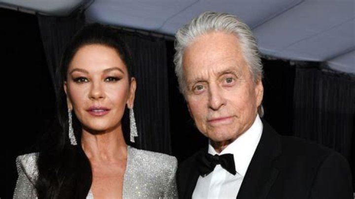 Michael Douglas twins with son Dylan in rare vacation photos with wife Catherine Zeta-Jones