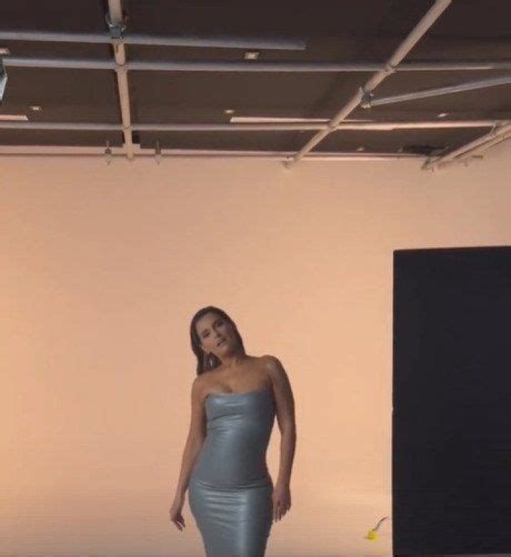 Nelly Furtado pours her curves into skintight latex dress that will turn your head