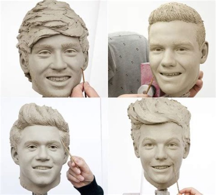 One Direction clay wax figures unveiled at Madame Tussauds.