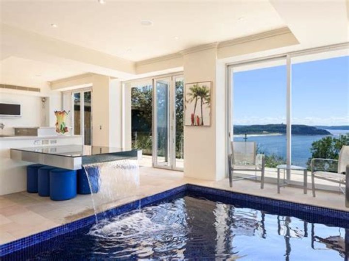 Palm Beach home of Angela Fleming with unique water feature table sells