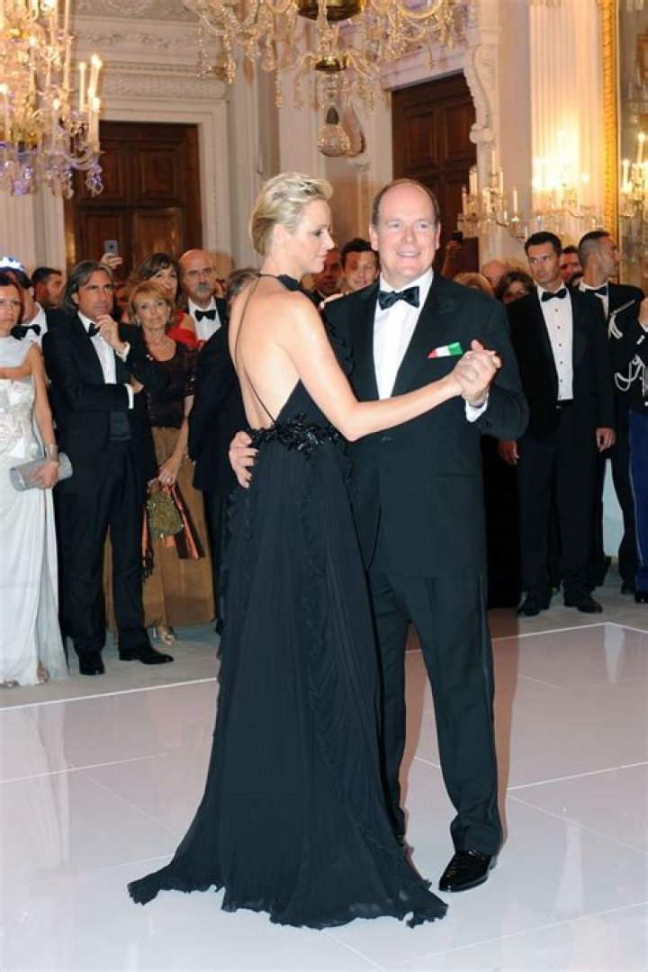 Princess Charlene's backless dress for date with Prince Albert will make you double take - see throwback photo