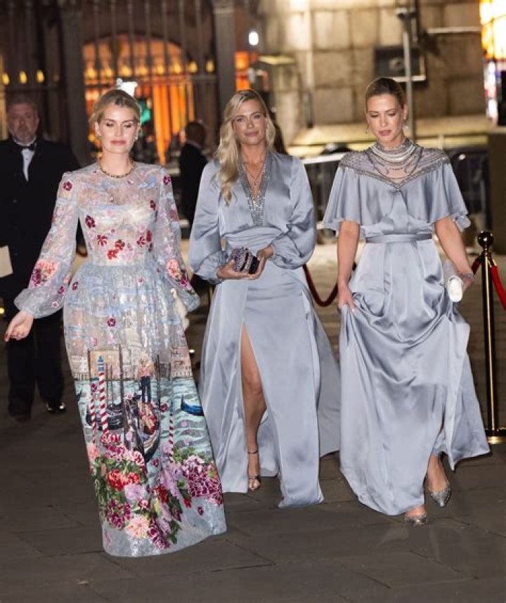 Princess Diana's glamorous niece Lady Kitty Spencer wows in red at Milan Fashion Week