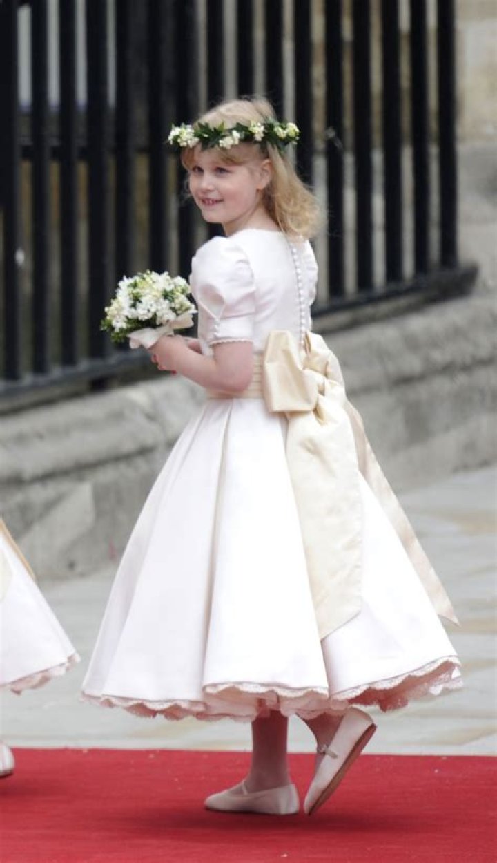 Princess Kate's bridesmaid Lady Louise Windsor, 7, is a mini Barbie in rarely-seen wedding photo