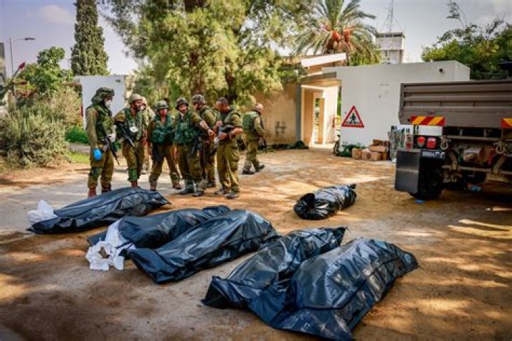 Reporter's notebook: In Israeli kibbutz rampaged by Hamas, volunteers still cleaning blood from homes