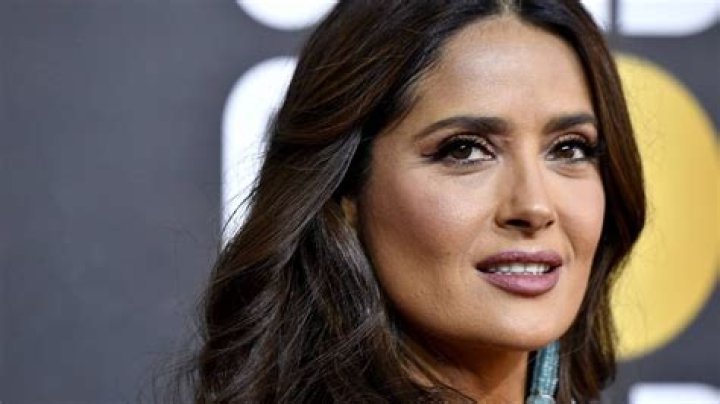 Salma Hayek's physique is phenomenal in electrifying blue dress - and fans are floored