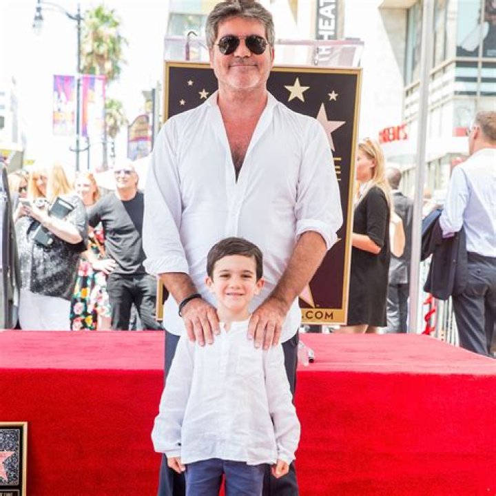 Simon Cowell's son Eric, 9, looks so grown up for rare red carpet appearance with mother Lauren Silverman
