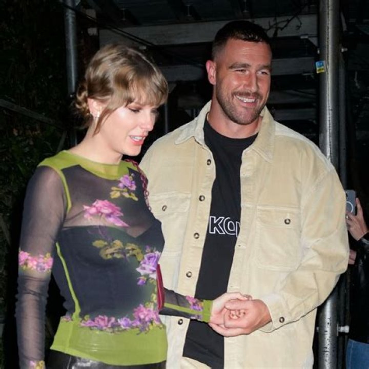 Taylor Swift and Travis Kelce don matching sweaters as they join Patrick and Brittany Mahomes at festive bash