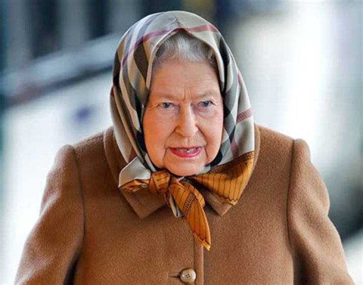 The Queen surprises in the ultimate Burberry accessory and we just love it