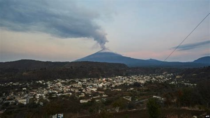 Volcano rumbles near Mexico City, coating towns with ash, disrupting flights